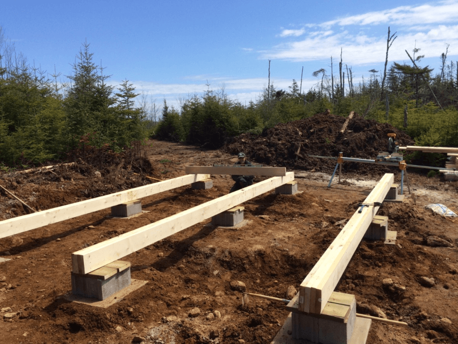 A foundation being built with wooden beams.