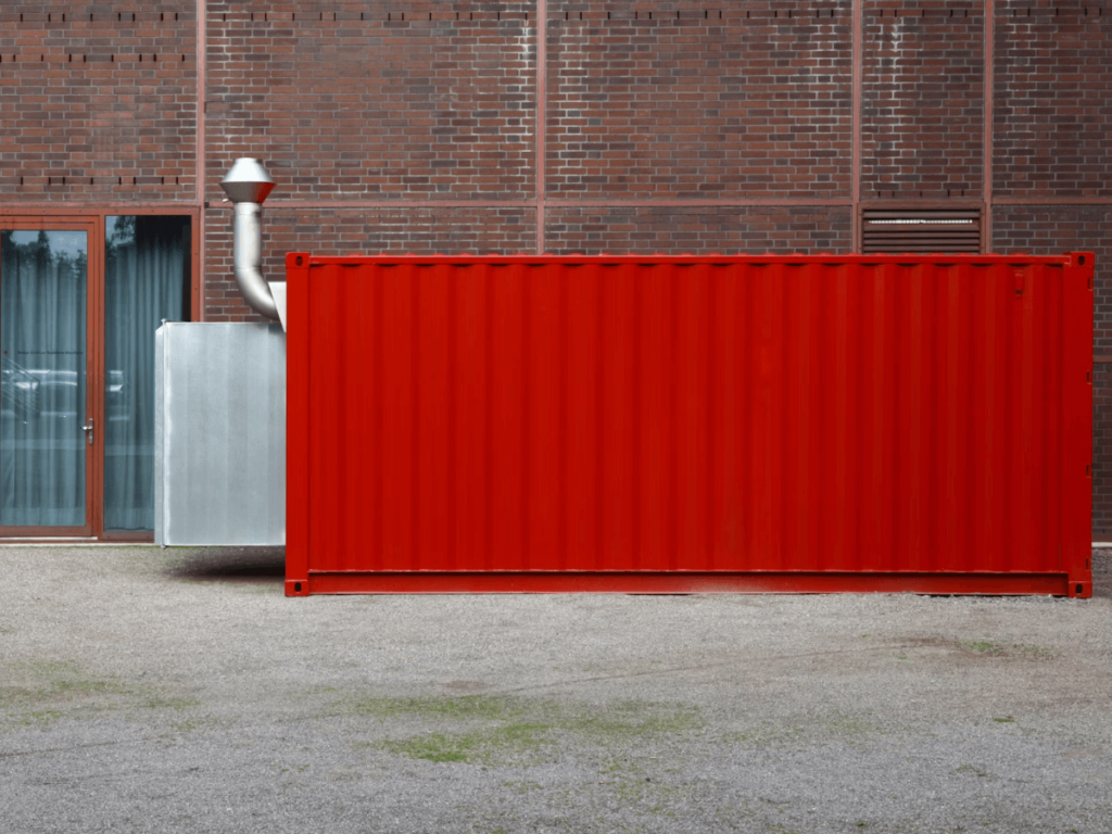 A red shipping container office.
