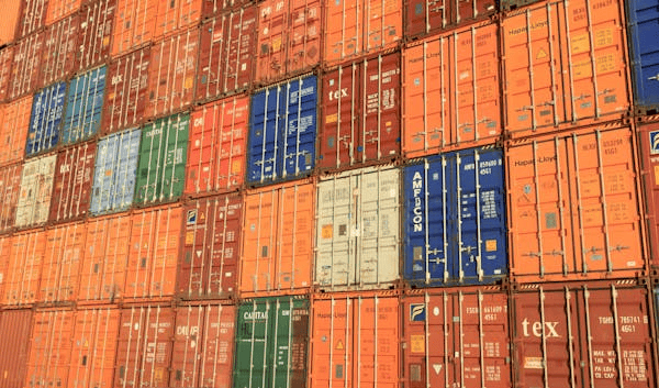 A wall of colorful storage containers stacked on top of each other