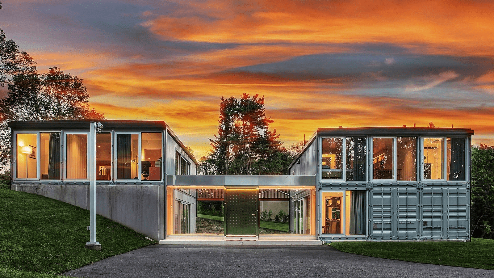 A home made out of multiple connected shipping containers