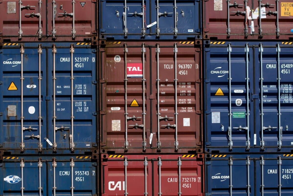 A grid of storage containers stacked on top of each other.